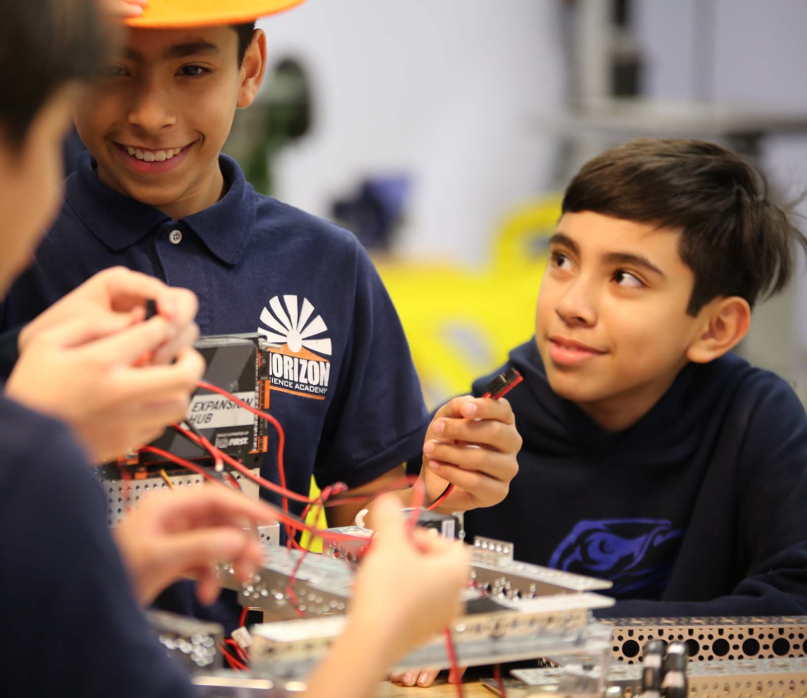 HSA McKinley Park Elementary School student wearing headphones uses a laptop in class